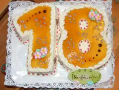 Conjunto de pasteles que forman el número 18