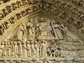 Tímpano de la Portada del Juicio Final (s. XIII), Catedral de Notre-Dame en París. San Miguel pesa las almas a los pies de Cristo mientras los demonios tratan de manipular la balanza.