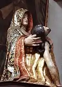 Virgen de la Pasión, primera imagen propiedad de la cofradía de la Pasión. Talla anónima de mediados del siglo XVI. Se custodia en la iglesia de San Quirce, sede de esta cofradía. Según el historiador Canesi, la talla fue una donación de Diego Sánchez Pintado, diputado de la cofradía.
