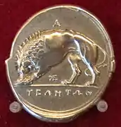 León comiendo una presa en una moneda de Velia (siglo IV a. C.)