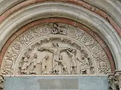 Detalle de la luneta del portal central, con el Martirio di Sant'Andrea