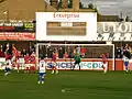 Un gol y el marcador en el estadio