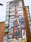 Mural alusivo a los Sucesos de Vitoria en un edificio de viviendas aledaño a la Plaza Tres de Marzo