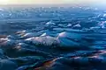 Paisaje de la cordillera de Verkhoyansk con montañas suaves y cuencas intermontañeras