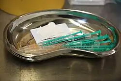 Syringes containing Pfizer COVID-19 vaccine doses