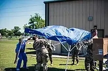 Texas National Guard personnel setting up a mobile testing station