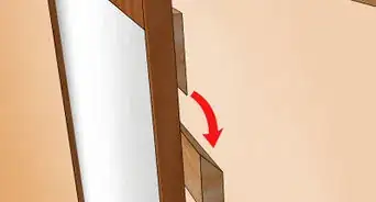 Cómo colgar un espejo de la pared: guía para evitar errores