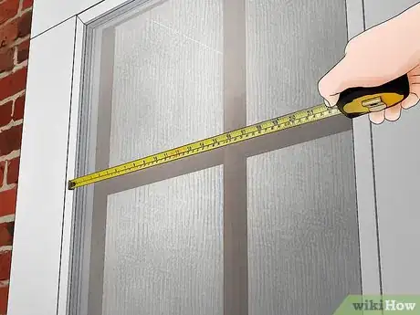 3 formas de colgar un espejo para puertas - wikiHow