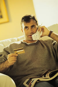 man holding credit card