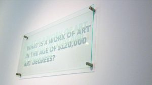 Statements (2013), BFAMFAPhD / Caroline Woolard, plexiglass, plaque hardware. CC-BY-ND 4.0