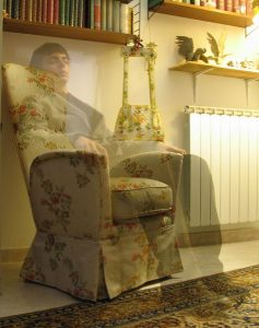 Photo of Niccolò Caranti. "A supposed ghost sitting on a chair". by Terrasque CC-BY-SA 3.0