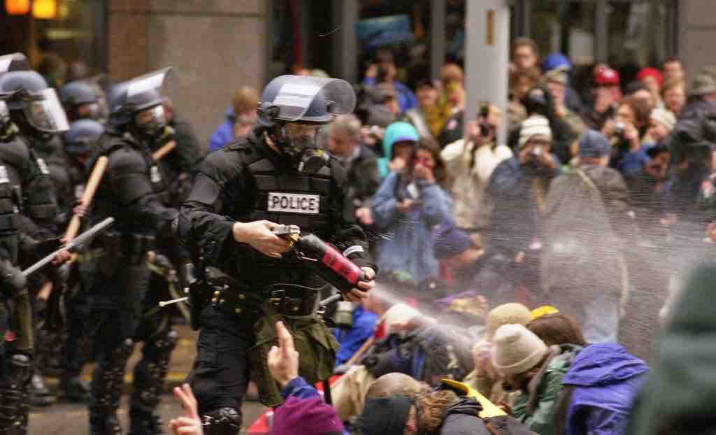 Protestors clash with police at the 1999 WTO summit in Seattle