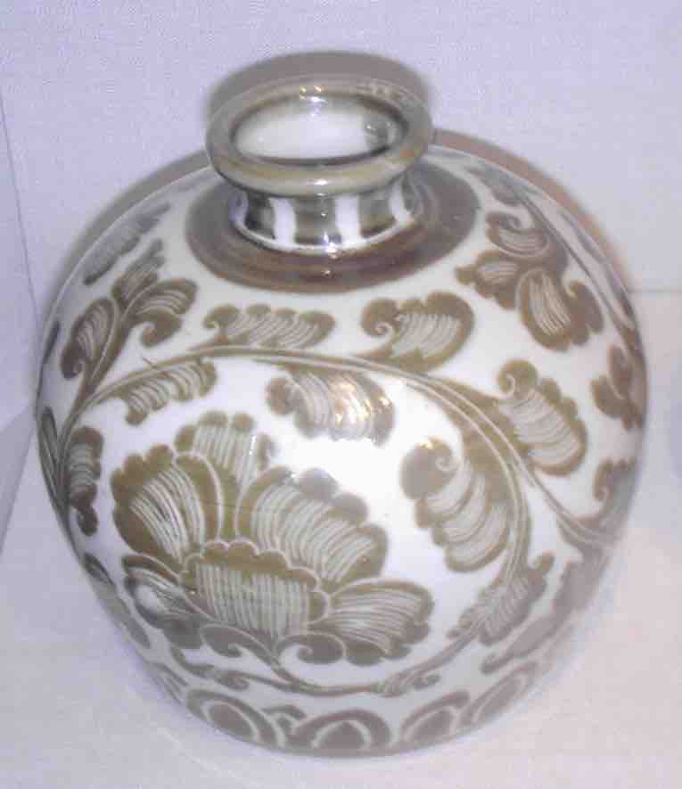 Song Dynasty ding ware porcelain bottle, 11th century