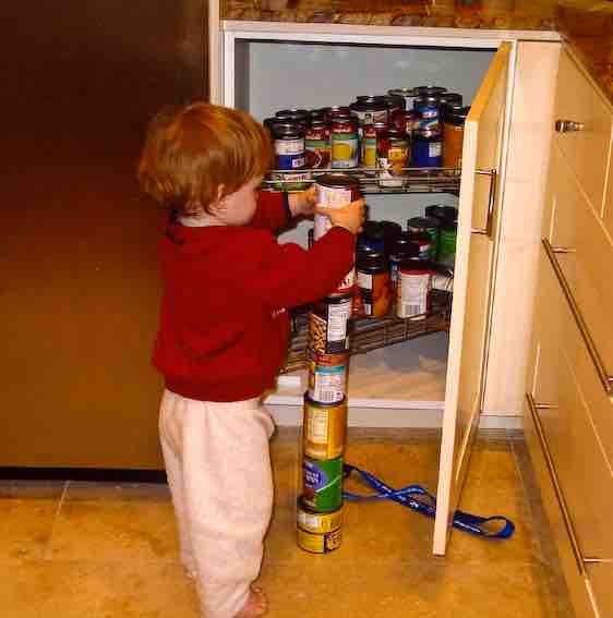 A child with autism stacking cans