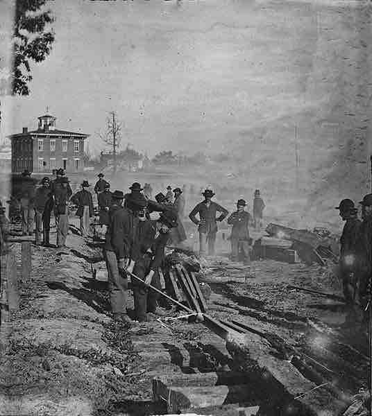 Sherman's men destroying railroad tracks. Atlanta, Georgia. 