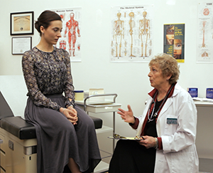 photo of a doctor consulting with a patient