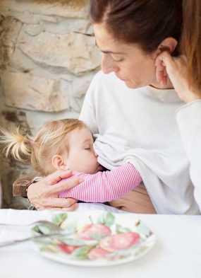 Photo: A woman breastfeeding in a public space