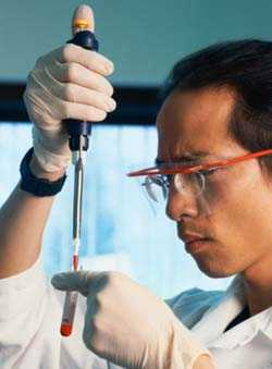 lab worker holding a test tube