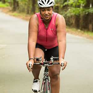 Carletta riding her bicycle.