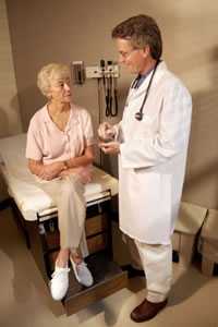 Photo: A doctor with a female patient