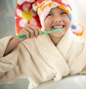 girl brushing teeth