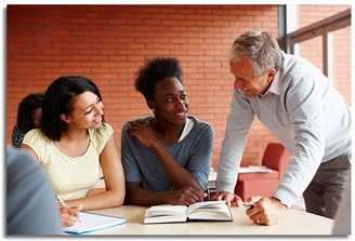 A teacher talking to two students.