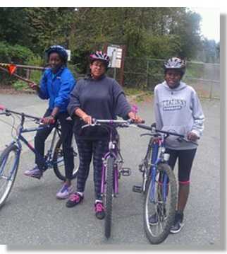 Women biking.