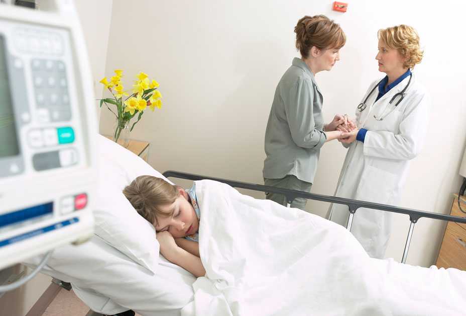 Young girl in hospital bed