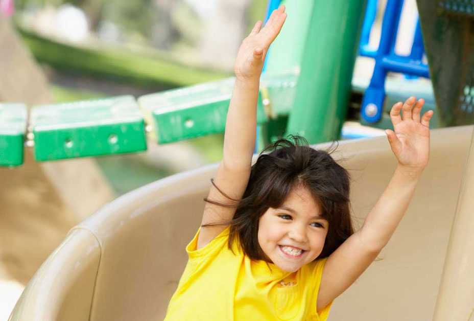 Young girl on slide