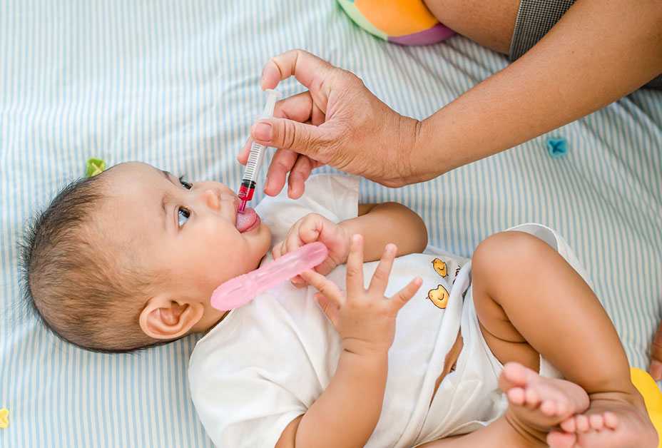 Baby taking medicine