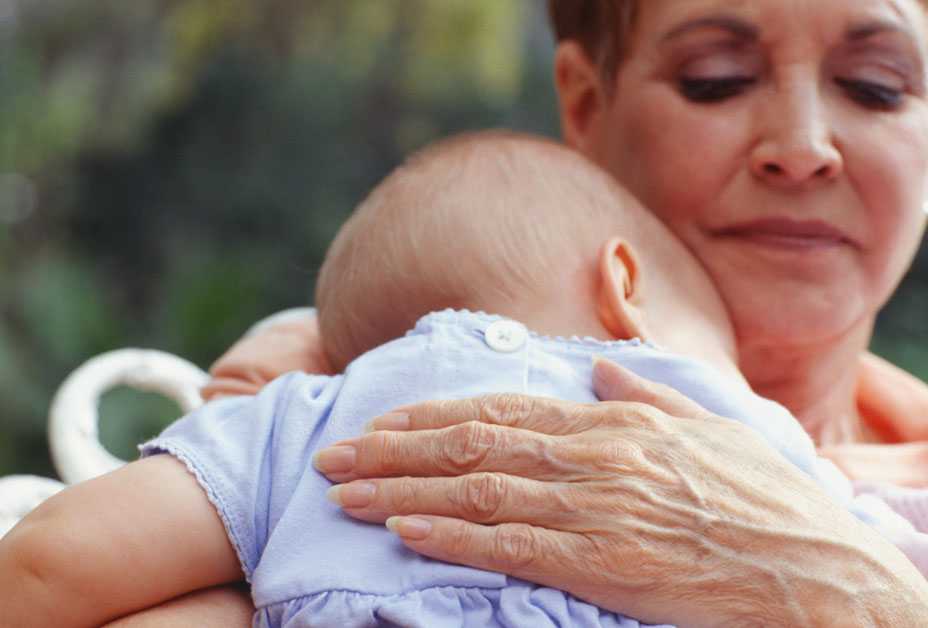 Grandmother holding baby