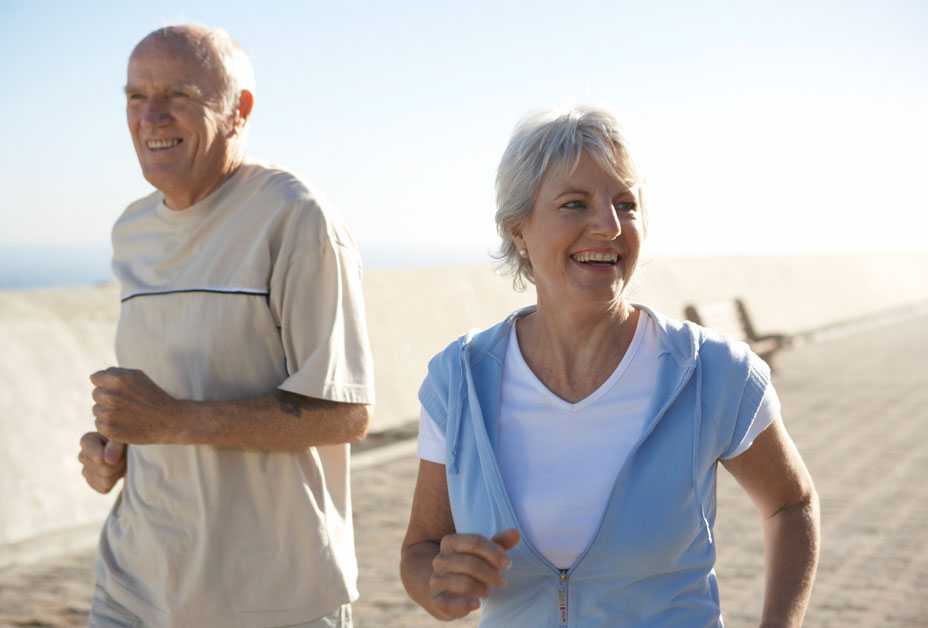 Man and woman walking on beach