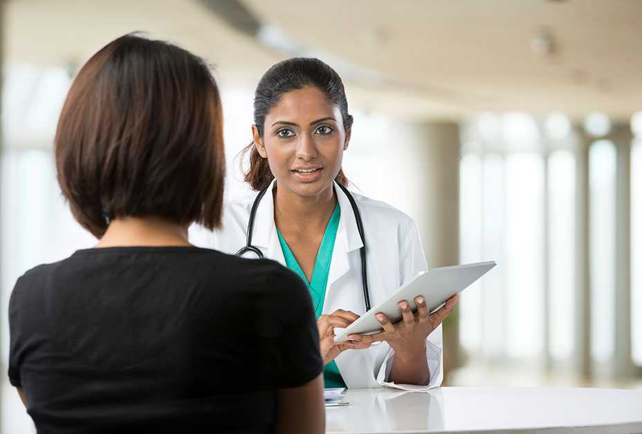 Female doctor and female patient