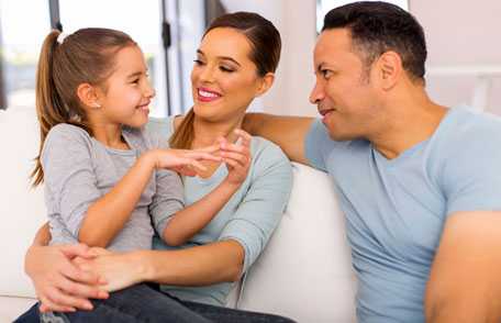 Mother and father with young daughter