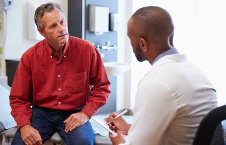 Doctor consulting with patient