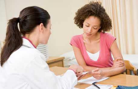 Doctor with female patient