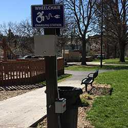 Power wheelchair charging station