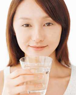 Woman with a glass of water