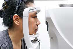 Woman getting eye exam