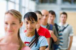 Group of teenagers standing in line