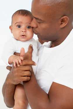 Father holding baby