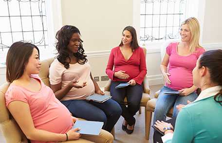 Group of pregnant women talking