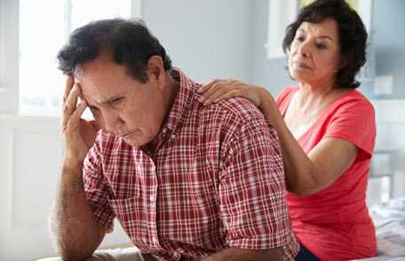 Woman consoling depressed man