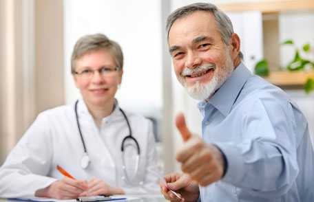 Doctor giving thumbs up after doctor consultation