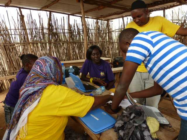 In Garfasa, Kenya, Kenya Medical Research Institute staff provide IT support for netbooks used by interviewers during the Kenya AIDS Indicator Survey.