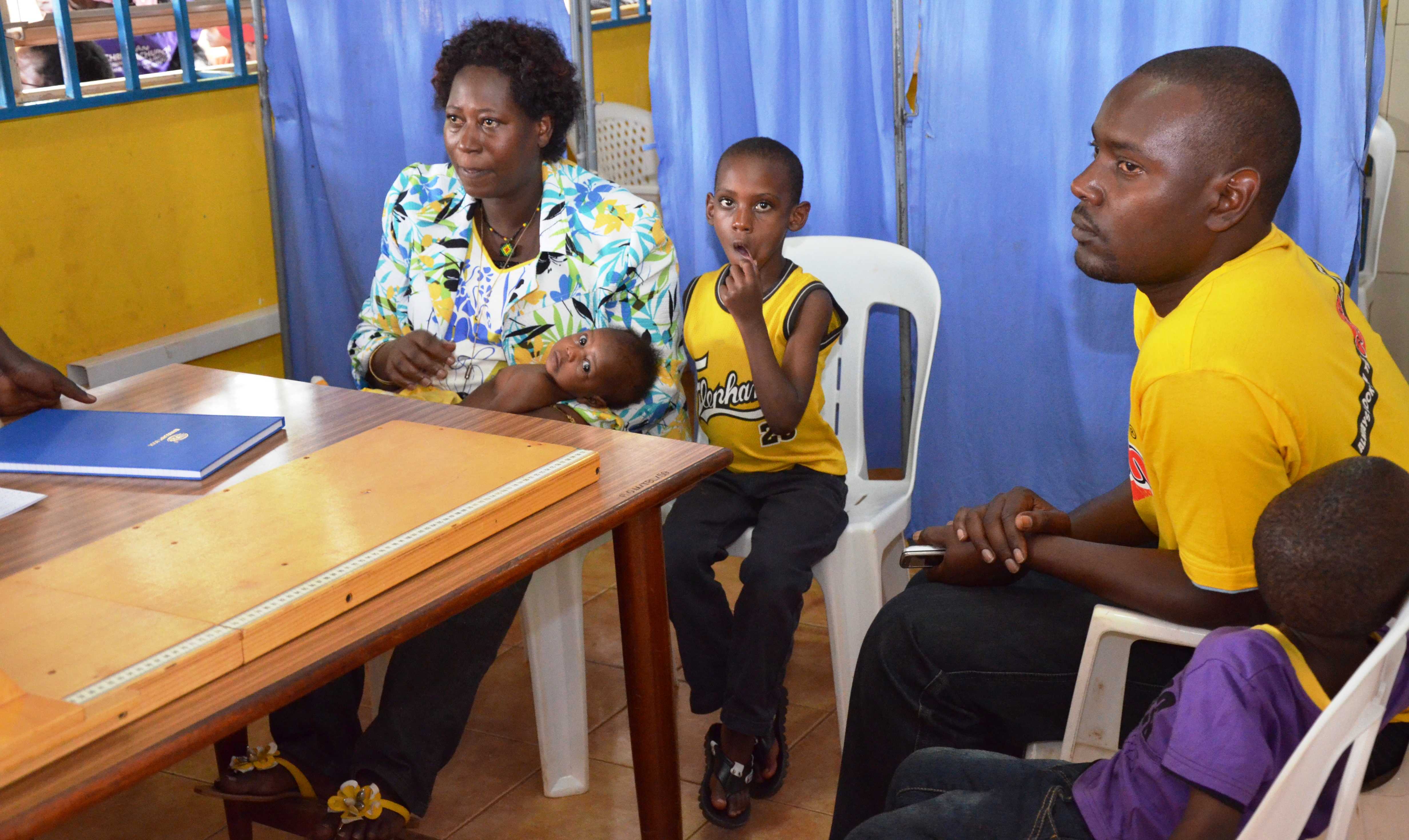 This Ugandan family is a beneficiary of CDC-supported services to eliminate mother-to-child HIV transmission through Reach out Mbuya in Kampala