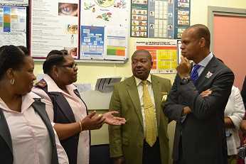 Ambassador Gaspard discusses the impact of the NIMART program with two NIMART-trained mentor nurses from Kwazakhele Clinic, Eastern Cape.