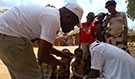 Geraldo Chambe, Mozambique FELTP resident, testing blood sample for malaria to evaluate the impact of a bed net campaign