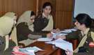 Senior female medical officers in the Pakistan Army doing a class assignment as a group during the diseasesurveillance training workshop in Pakistan, March 2014.