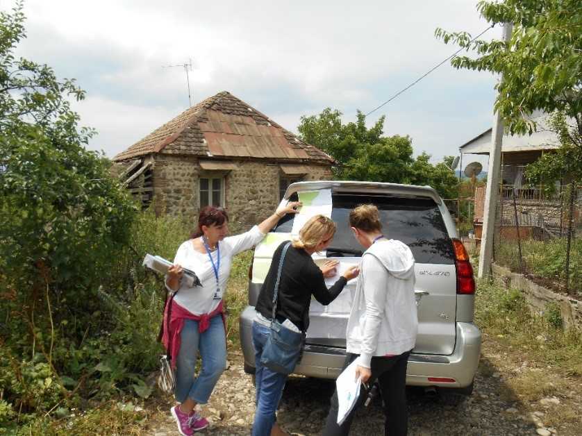 The team locates survey households in Georgia.